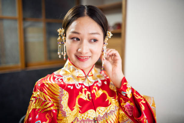 istock Chinese bride with traditional wedding dress 1161526400