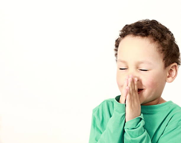 istock little boy praying to God 1161527629