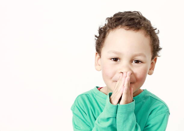 istock little boy praying to God 1161527633