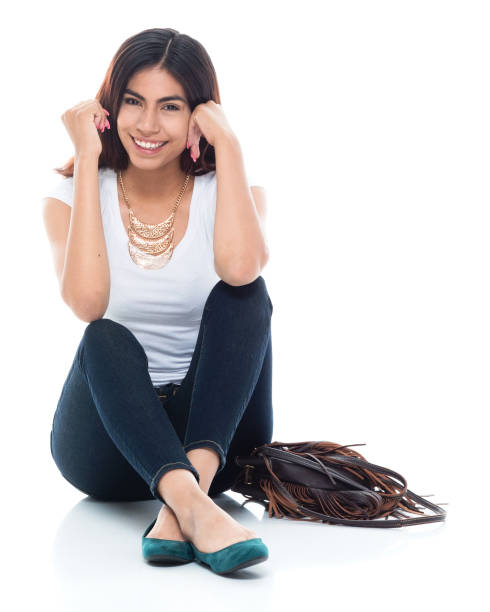 istock Cute female sitting on the ground 1161527936