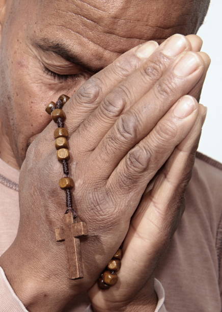 istock black man praying to god 1161531533