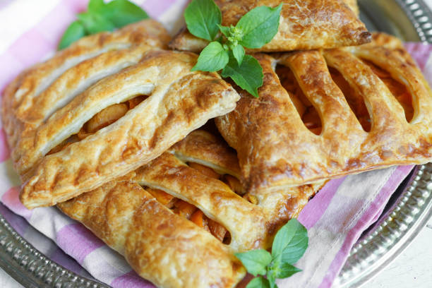 istock Plate with yummy berry puff pastry with apples and mint on table 1161533637