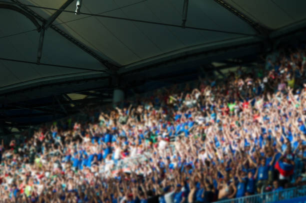 istock Blurred crowd of spectators on a stadium 1161533785