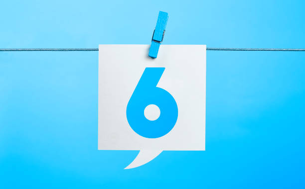 White Number 6 Chat Bubble Hanging On Blue Background White Number 6 Chat Bubble Hanging On Blue Background With the Latch number 6 photos stock pictures, royalty-free photos & images