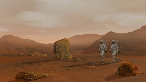 istock 3D rendering. Colony on Mars. Two Astronauts Wearing Space Suit Walking On The Surface Of Mars. 1161537037