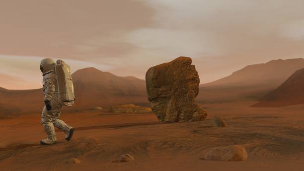 istock 3D rendering. Colony on Mars. Two Astronauts Wearing Space Suit Walking On The Surface Of Mars. 1161537084