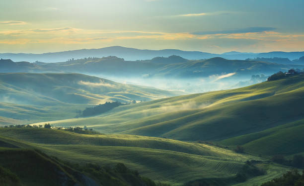 istock Landscape in Crete Senesi, Tuscany at sunrise 1161538377