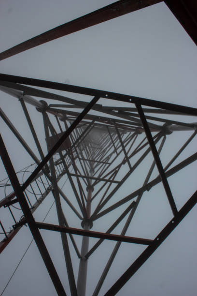 Triangle These trusses disappearing into the morning fog triangle building stock pictures, royalty-free photos & images