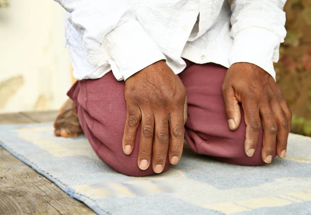 istock Muslim man on knees praying 1161543150