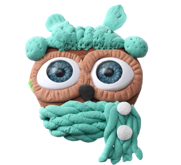 istock plasticine owl isolated on white background. modelling clay 1161545876