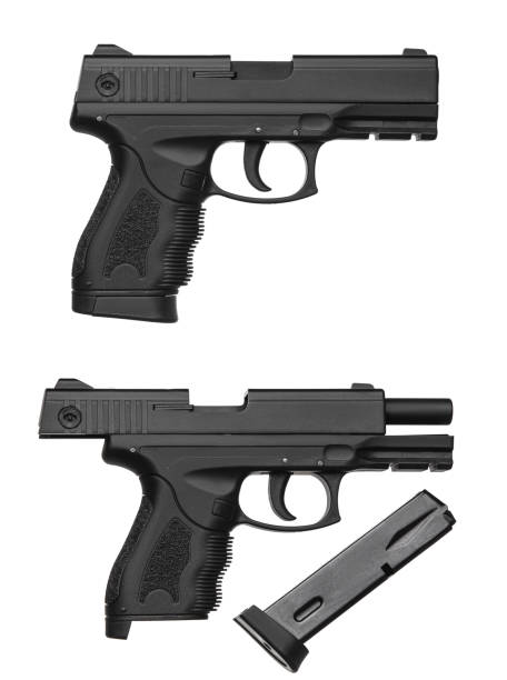 istock Black gun pistol isolated on white background 1161546986
