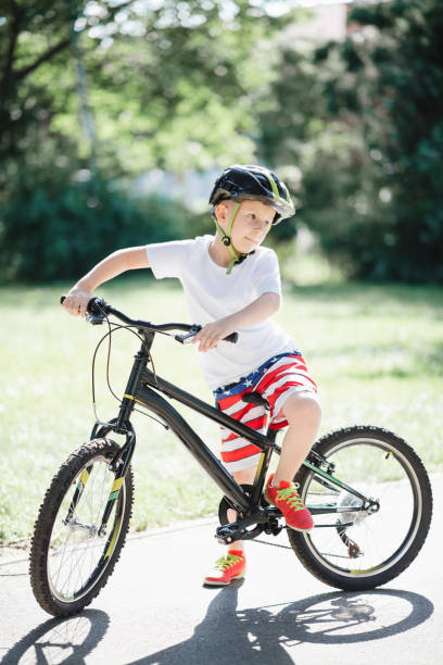 istock Boy on his bike in nature 1161547247