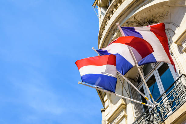 istock Three french flags decking a building in Paris, France. 1161548891