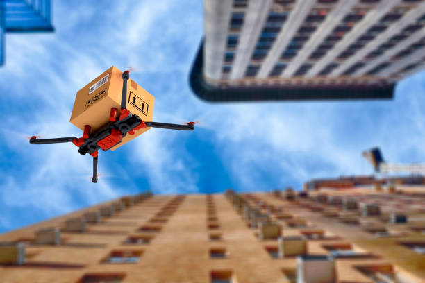 istock Delivery drone flying in city 1161549705