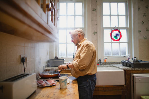 Man In Kitchen 37,900+ Old Man In Kitchen Stock Photos, Pictures & Royalty-Free Images ...