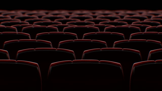 Moving Behind the Chairs in Abstract Cinema Hall with Black Screen Seamless. Looped 3d Animation of Rows of Seats in Cinema. Art and Media Concept.
