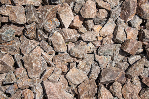 istock Background from fragments of granite stones close up 1161557420