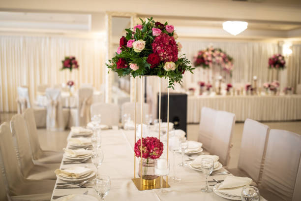 istock Romantic floral wedding decoration in restaurant 1161558383