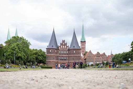Lübeck, Germany - July 9, 2019: low angle view to Holstentor, the landmark of Lübeck.