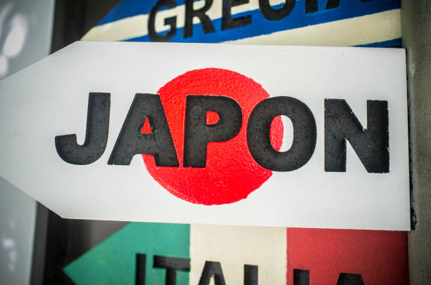 istock Pole guidepost with Japan sign and flag as background 1161560837