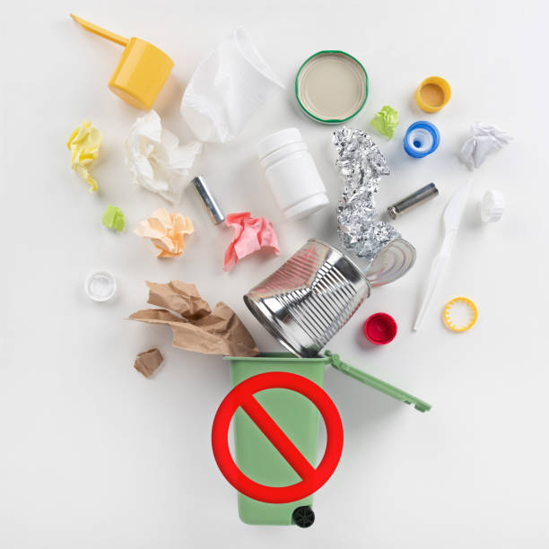 istock top view of trash bin and unsorted garbage on grey 1161561032