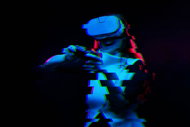 istock Woman with virtual reality headset is playing game. Image with glitch effect. 1161561231