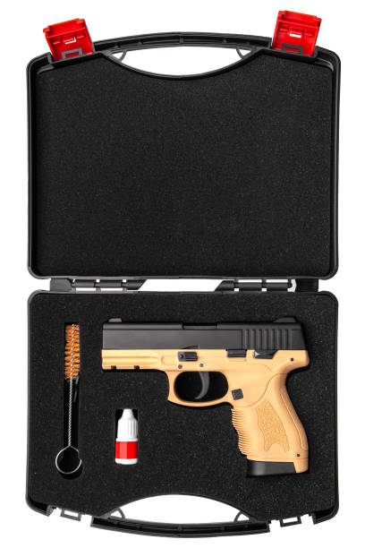 istock Black brown pistol in a special plastic case for transportation and storage isolated on white background 1161563865