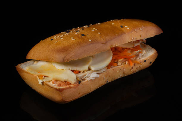 istock Vegetarian hot dog on a black background 1161564217
