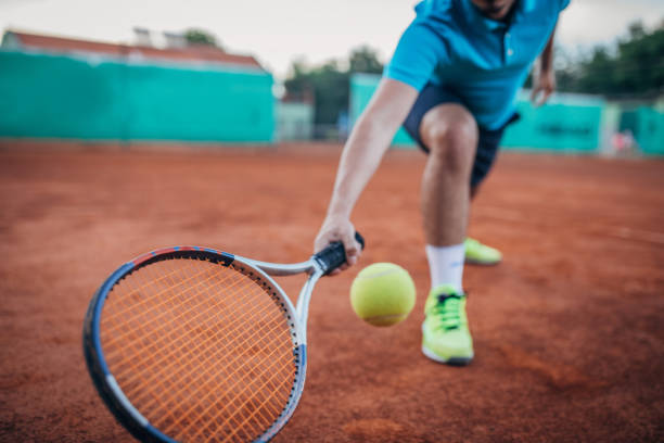 istock Man tennis player playing a match 1161565095