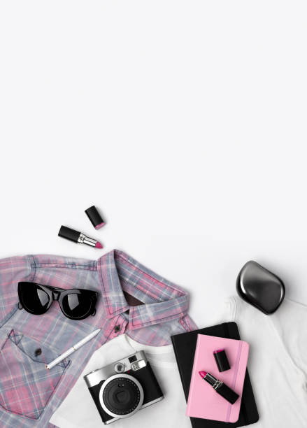 istock Women's t-shirt, snickers, sunglasses, camera, notepad and lipstick. 1161566565