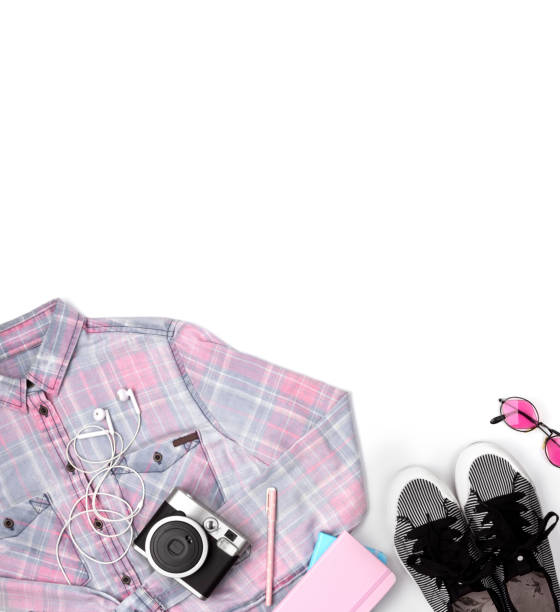 istock Women's t-shirt, snickers, sunglasses, camera and notepad. 1161566585