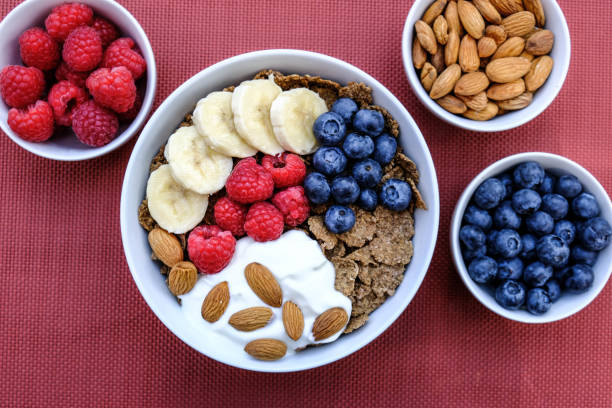 Breakfast Bowl of Cereals Fresh Fruit and Nuts With Yogurt