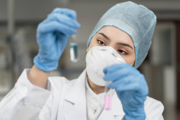 istock Female scientist looking at the scientific sample in the CDC laboratory 1161567354