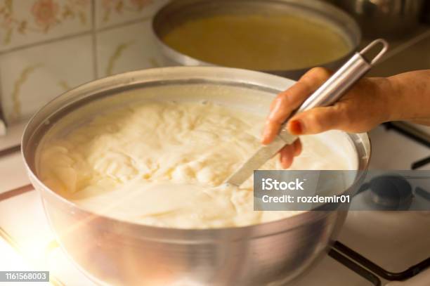 Hands Of Senior Woman Who Is Making Yogurt Stock Photo - Download Image Now - Yogurt, Homemade, Making