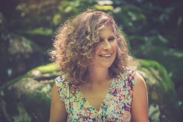 istock Content young woman portrait in nature 1161569885