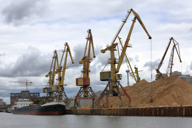 istock Old industrial crane in the river port 1161572286