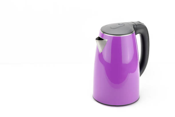 istock Purple stainless steel kettle on the white mat background 1161577303
