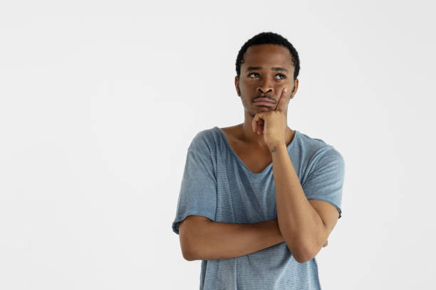 istock Portrait of young man isolated on white studio background 1161577799
