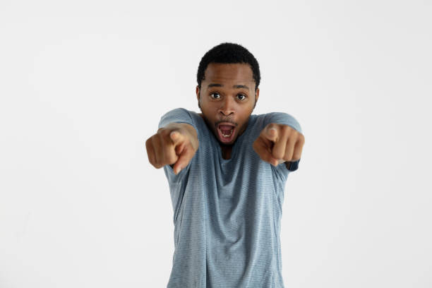 istock Portrait of young man isolated on white studio background 1161577802