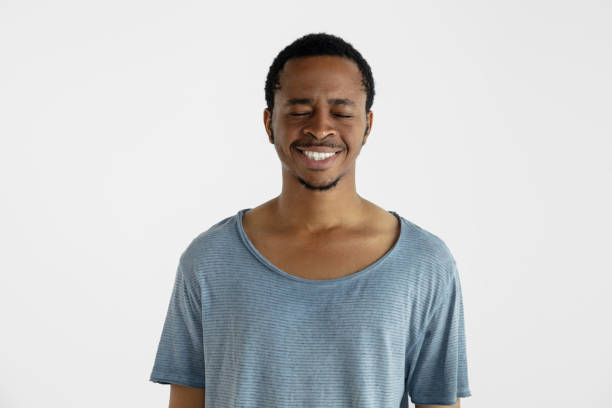 istock Portrait of young man isolated on white studio background 1161577811