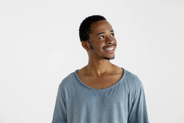 istock Portrait of young man isolated on white studio background 1161577820