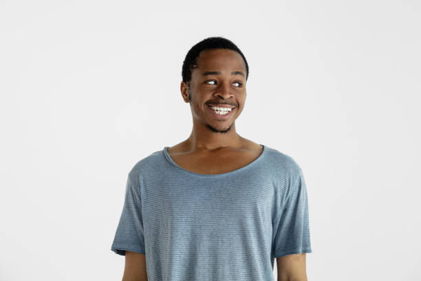 istock Portrait of young man isolated on white studio background 1161577831