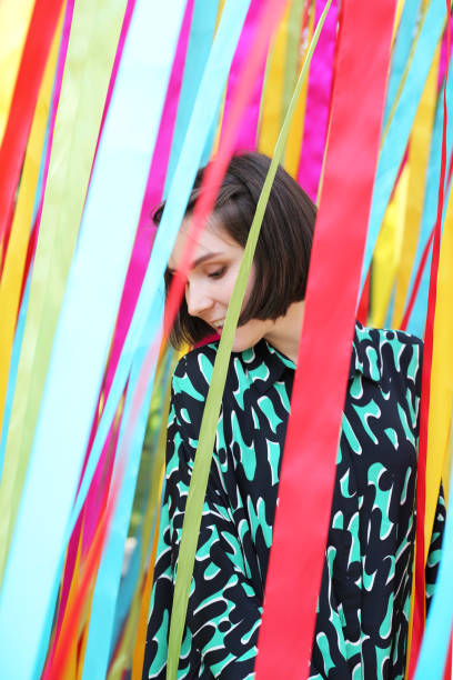 istock Girl in ribbons 1161578470