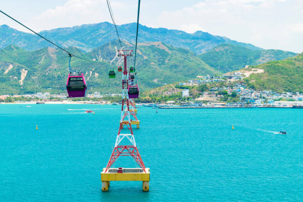 istock Cable car cabin to the amusement park on green island with funicular support 1161581298