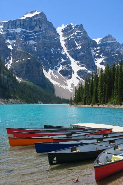 istock Canoes at Moraine Lake 1161582354