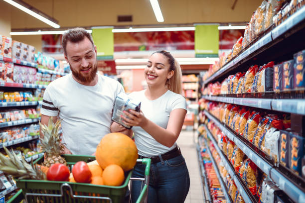 istock Happy Couple Enjoying Shopping Time 1161583766