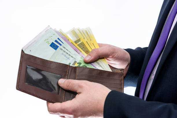 istock Male hands with wallet isolated on white 1161584234