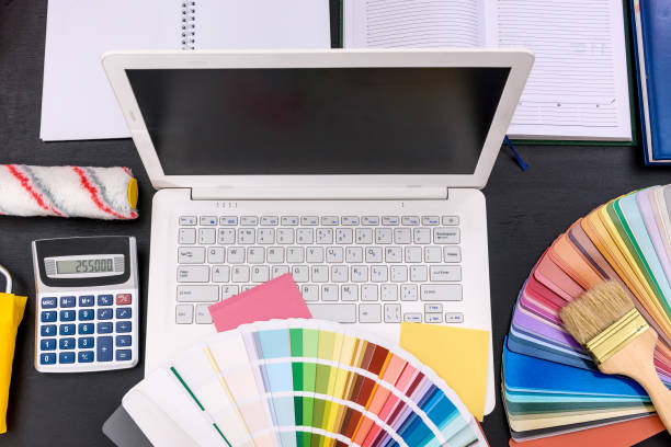 istock Architect's project with color swatch and calculator 1161585125
