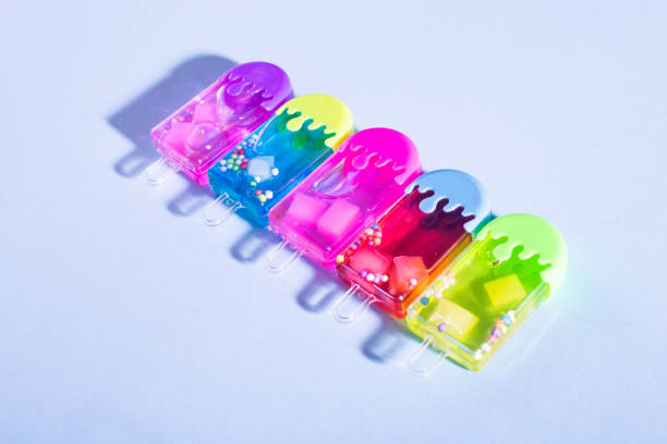 istock Colorful Ice cream popsicles on pastel blue background. Minimal summer concept. Flat lay. 1161586616