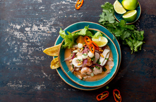 PERUVIAN CEVICHE SEBICHE. Peruvian seafood and fish sebiche with maize PERUVIAN CEVICHE SEBICHE. Peruvian seafood and fish sebiche with maize. seviche photos stock pictures, royalty-free photos & images
